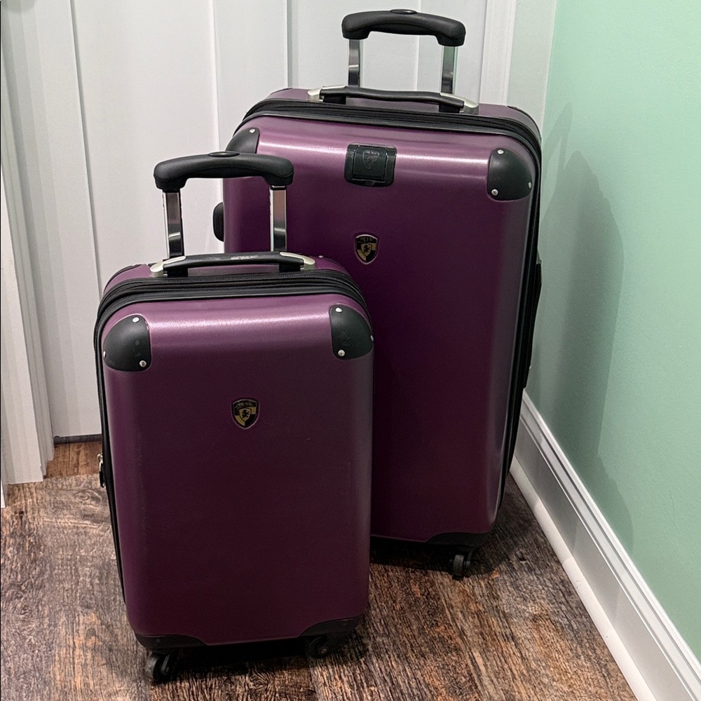 2 Piece Set Of Heys Hardside Spinner Luggage In Purple. Carry On And Checked Bag